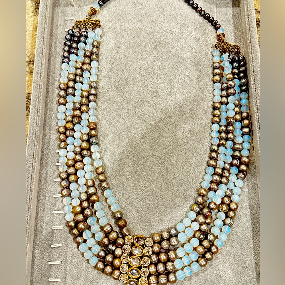 Necklace with beads and embellishments